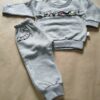 2026/06/1001346955-scaled.jpg conjunto frizado Gris